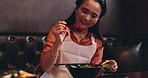 Japanese woman, herbs and smile for healthy dish, food or traditional cuisine as diet in restaurant. Female person, flavor and happiness in culinary culture, lunch or meal prep as seasoning or recipe
