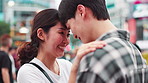 Happy couple, love or hug in Japan city for travel, affection or commitment in healthy relationship. Japanese people, bonding or forehead touch in urban Kyoto with loyalty, trust or support with care