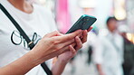 City, hands and typing with phone outdoor for online networking, text message and email response. Japanese person, smartphone and closeup with internet search for travel location and urban town map