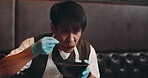Japanese, man and soy sauce for taste in restaurant, lunch and prepare dish for dinner with smile. Proud, male person and satisfied with tsuyu for noodles, ramen or sour for culinary culture of Japan