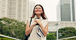 Japanese woman, phone and happy in city with texting, excited and reflection with app in urban park. Person, smartphone and smile with contact, notification and social network in street for travel