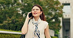 Japanese, business and woman with phone call in city for communication, schedule update and contact. Girl, walking and mobile chat of discussion, travel information and corporate negotiation in Japan
