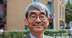 Happy, business and face of Asian man in city for company pride, opportunity and confidence. Professional, smile and portrait of mature Japanese person in town for travel, morning commute and trip