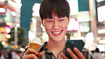 Man, phone and happy with ice cream in city at night with travel, texting and contact on mobile app. Gen z person, eating and smartphone in street with cone, gelato or desert on social media in Japan