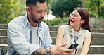 Couple, phone and steps with laugh in city, park and social media for travel and vacation destination. Japanese man, woman and funny meme with adventure, scroll and nature trip on holiday in Tokyo