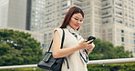 Japanese woman, outdoor and mobile phone with walking, typing and conversation in street or city. Female person, texting and happiness on technology for connection, social media app and communication