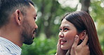 Happy couple, Indonesian and nature with love for bonding, romance or holiday vacation. Face, man and woman with smile for travel, journey or romantic honeymoon together in forest, woods or park