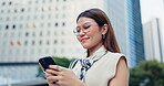 Japanese woman, outdoor and mobile phone with typing, smile and conversation in street or city. Female person, texting and happiness on technology for connection, social media app and communication