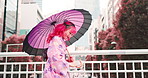 Woman, bow and walking in city of Japan, outdoor bridge and travel in Kimono for culture. Female person, traditional clothes and sign of respect in town for heritage, local fashion and explore urban