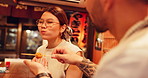Food, eating and Japanese couple in restaurant, taste and conversation with healthy meal. Fine dining, man and happy woman with love, romance and relationship with marriage, feeding and dating