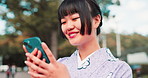 Travel, kimono and Asian woman in city with phone typing for social media, networking and communication. Happy, traditional fashion and Japanese person on smartphone for online map, website and chat
