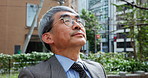 Breathing, business and calm with Japanese man in city for balance, stress relief and peace mindset. Mental health, wellness and corporate with mature person in outdoors for professional and thinking