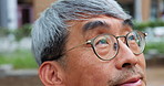 Thinking, business and calm with Japanese man in city for balance, reflection and peace mindset. Mental health, wellness and corporate with mature person in outdoors for professional and vision