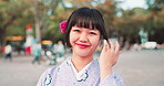 Happy, face and kimono with Japanese woman in park for traditional festival, hanami and spring season. smile, peace and culture with portrait of asian person for fashion, heritage and yukata