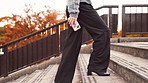 Stairs, walking and business person in city for morning commute, travelling and journey in urban town. Professional, worker and woman on steps with phone for work trip, journey and career in Japan