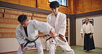 Fight, students and martial arts in dojo for karate, kung fu and practice with fitness, people and learning. Training, submission and workout for exercise, class and self defense with combat in Japan