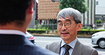 Talking, morning and team with business people in Japan city for mentor, conversation and client negotiation. Partnership, corporate and travel with men in outdoors for discussion and collaboration