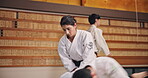 Fight, students and training in dojo for karate, kung fu and practice with fitness, people and learning. Martial arts, submission and workout for exercise, class and self defense with combat in Japan