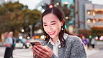 Smile, typing and woman in city with phone, connection and funny online chat on morning commute. Smartphone, search and Japanese girl in street on mobile app for social media, laugh and urban travel