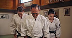 Face, people or bow in dojo for martial arts practice, discipline or self defense in class. Respect, mature sensei or students in Japan for learning combat or training for fighting education or honor