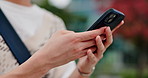City, typing and hands of person with phone, online chat and checking schedule on morning commute. Urban, travel and Japanese university student with smartphone, search and mobile app for direction