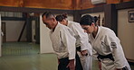 Class, people or bow in dojo for learning karate, discipline or self defense for coaching. Respect, mature sensei or students in Japan for teaching combat or training for fighting education or honor