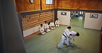 People, students and training in Japan for karate, kung fu and practice with fitness, fight and battle. Martial arts, discipline and workout for exercise, class and self defense with combat in dojo