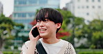 Travel, walk and Asian man in city with phone call, conversation and connection on campus. Urban, park and Japanese university student with smartphone, happy face and communication on morning commute