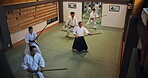 People, students and weapon for aikido, training and martial arts with fitness, kung fu and battle in Japan. Teaching, bokken and sensei for karate, fight and self defense class with exercise in dojo