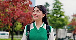 Japanese, woman and happy with walking in city, travel journey and adventure with expression outdoor. Urban, female person and tourist with commute for destination, location and amazed girl in Tokyo
