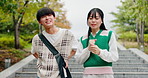 Japanese couple, talking and walk in park, stairs and city with care, together and travel with love in summer. Man, woman and gen z people for connection, bonding or conversation on steps in sunshine