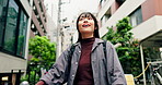 Woman, thinking and bicycle in city for travel, location and building with adventure, commute and trip. Asian person, inspiration and bike in urban town for transport, exercise and morning in Japan