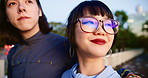 Face, smile and travel with couple in Japan together for bonding, romance or sightseeing at night. Happy, love or thinking with man and woman in city for date, honeymoon or tourism on holiday