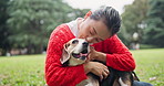 Japanese woman, dog and park with kiss, friendship and bonding for wellness and travel with journey. Asian person, puppy and pet care with walk, fresh air and outdoor path in nature for training