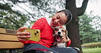 Woman, dog and smile in selfie at park, face and love with connection, excited or hug for bonding in nature. Person, animal and pet beagle puppy with care, loyalty and photography for memory in Japan