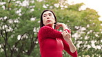Ballet, dancer and Asian woman in park stretching for performance, dancing and practice. Creative, entertainment and Japanese ballerina warm up for movement, balance and artistic talent in nature