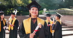 Face, excited and woman with scroll at graduation for education, achievement and university certificate. Happy, student and diploma for award celebration, studying success and academic event in Japan