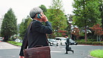 Phone call, walking and business Asian man in city for contact on commute, travel and trip. Professional, corporate and mature Japanese person on smartphone for communication, networking and chat