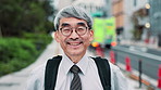 Smile, face and Japanese businessman in city waiting for public transportation with positive attitude. Happy, confident and portrait of mature male finance executive with pride for career in town.