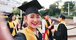 Graduation, excited and selfie for success, achievement or goals at college celebration. Happy Japanese man, diploma or education award for hope, winning students and smile for academy scholarship