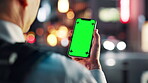 Green screen, night and hand with smartphone, city and undercover journalist with info and message. Outdoor, display and communication for story with mobile, tracking markers and person in Japan