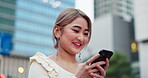 Woman, phone and city for networking in Japan, typing message and online for social media. Female person, outdoor and communication app on urban adventure, chat and internet for travel connection