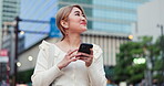 Woman, phone and city for journey in Japan, typing message and online for social media. Female person, outdoor and communication app on urban adventure, walking and internet for travel connection