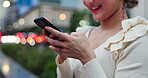 Woman, phone and city for hands in Japan, typing message and online for social media. Female person, outdoor and communication app on urban adventure, networking and internet for travel connection