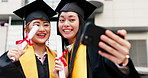 Graduation, women and selfie with laughing at university for diploma ceremony or education milestone. Japanese students, excited friends and cheering on video call for success and celebration memory