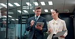 Man, woman and tablet with documents in corridor, office or review for project at insurance agency. Japanese business people, discussion and team at night, paperwork or digital touchscreen at company
