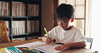 Homework boy and kid with education, writing and smart with knowledge. learning and Japanese. Apartment, childhood and student with creativity, notes and answer with inspiration, ideas and thinking