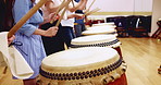 Music, drums and instrument with musician in studio for class, performance or practice. Traditional Japanese art, taiko band and sound with bachi, demonstration and talent for percussion teaching