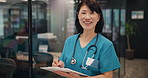 Happy, asian woman and nurse with clipboard for medical prescription, insurance or patient records at hospital. Portrait, female person or healthcare worker with smile or notes at clinic in Japan