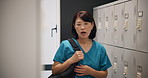 Woman, healthcare and nurse in locker room for tired, burnout and medical professional with bag. Mature person, depression and overworked in hospital for shift change, wellness and morning in Japan